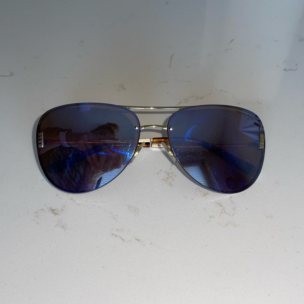 Tiffany & Co. sunglasses. Blue Lens, silver frame with Tiffany blue